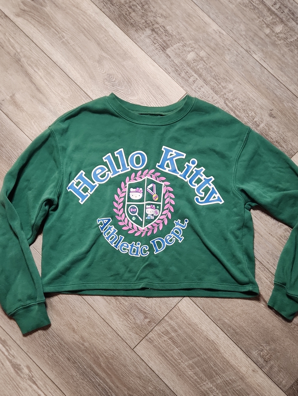 Sanrio Hello Kitty Green Crewneck Sweatshirt with Pink & White Crest